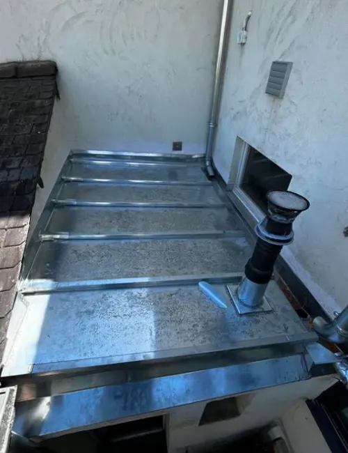 demoussage toiture joue les tours